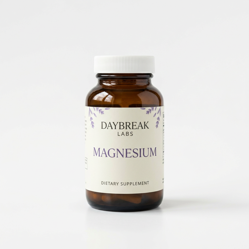 Daybreak Labs Magnesium Capsules amber bottle on a white studio background